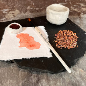 Madder paint in a clay pot